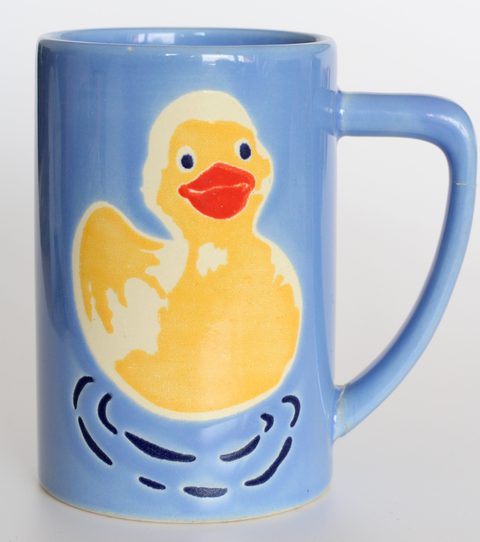 The original photo: the mug on a light grey studio backdrop
